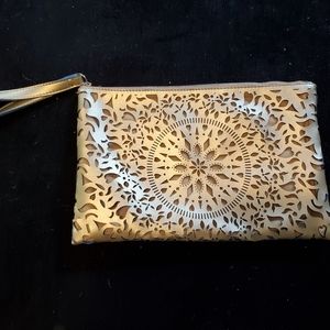 Carlos by Carlos Santana laser cut metallic clutch